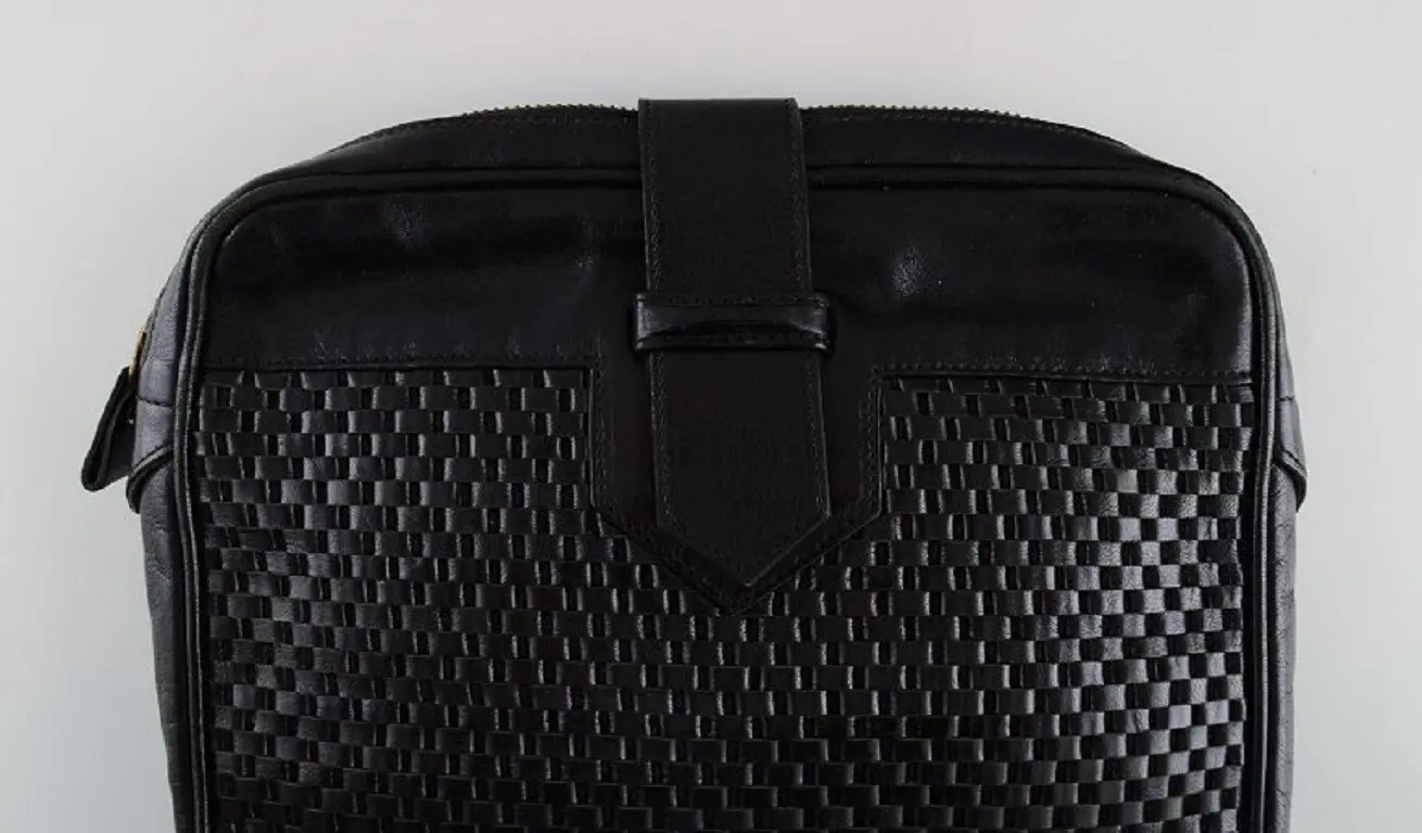 Retro Yves Saint Laurent Geldbörse aus schwarzem Leder mit geflochtenem Design